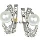 Ein Paar Ohrringe mit Brillanten und echten Perlen, 585-er Weißgold